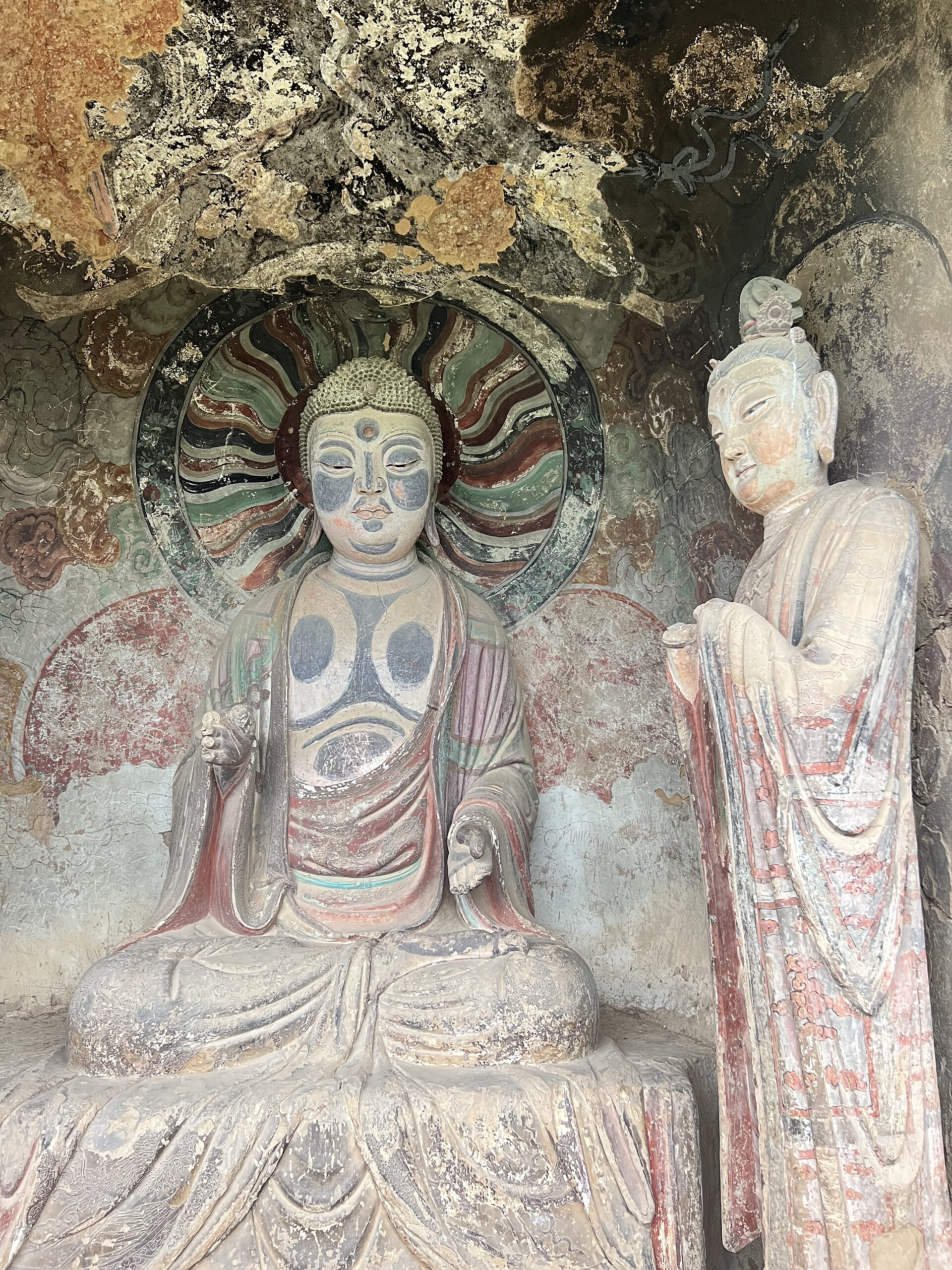 Painted clay sculpture inside a Maijishan Grottoes niche